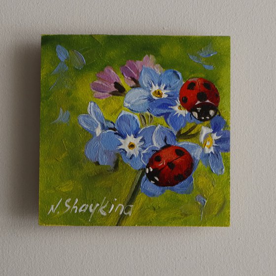 Ladybugs and Blue Flowers