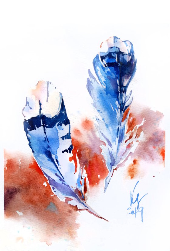 Two blue bird feathers