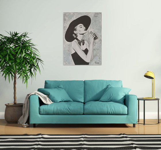 Woman with a bottle of perfume