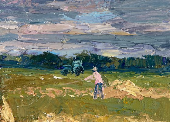 Working in the Field under a Blue Clear Sky