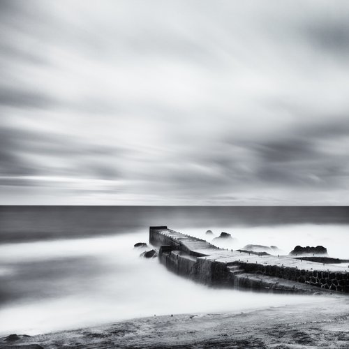 Ocean pier at dawn by Karim Carella