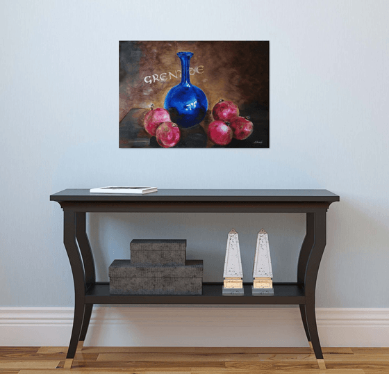 Still life with pomegranates and blue vase