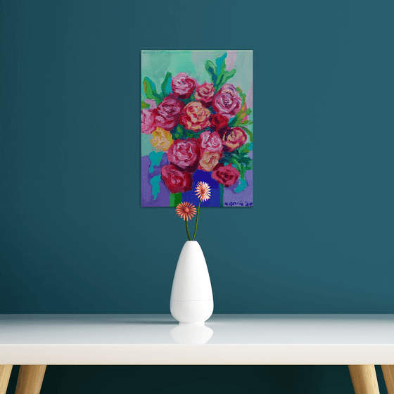 Roses in a blue vase
