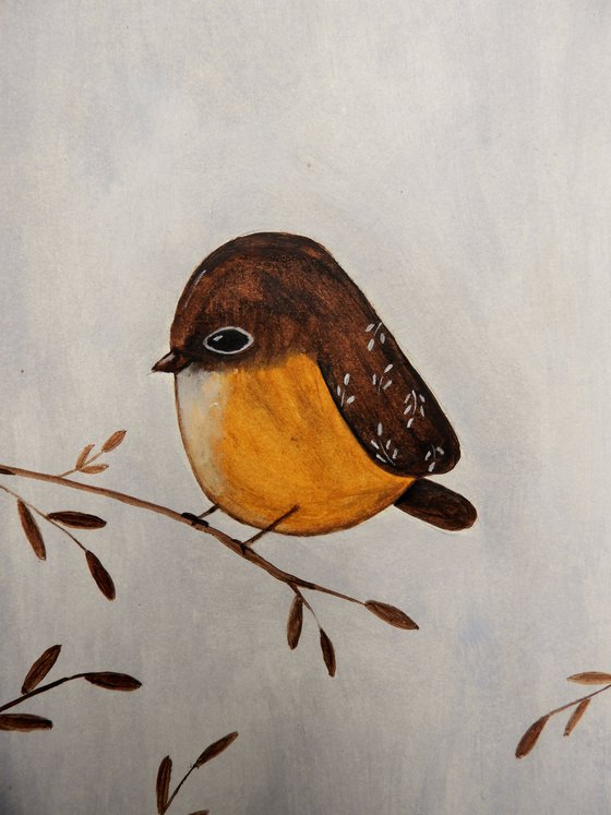 The small bird in brown