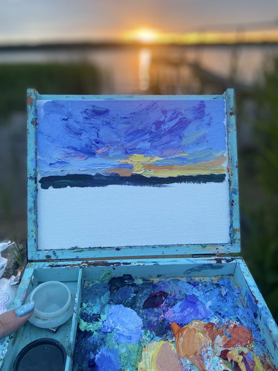 "Sunset in the Volga river"