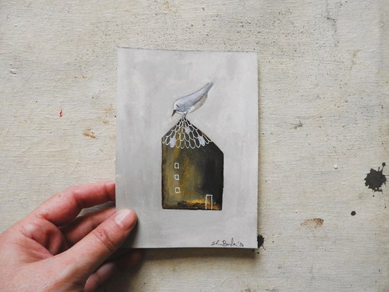 The tiny house and the bird