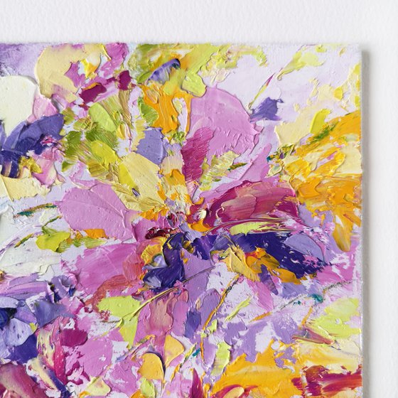 Small oil painting with colorful abstract flowers