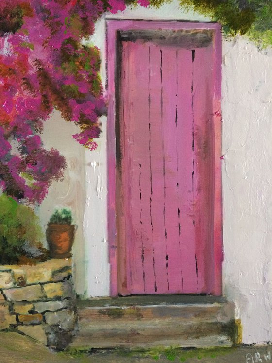 Mediterranean House with Pink Flowers