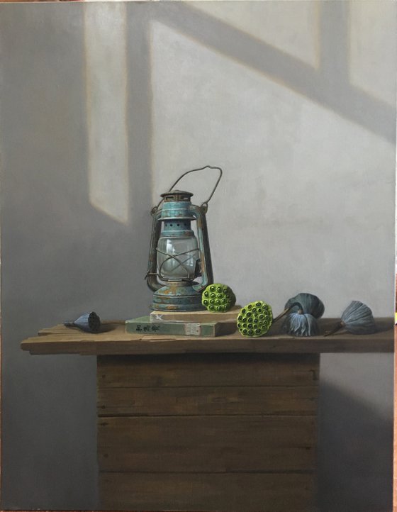 Still life zen art:kerosene lamp with lotus seedpod