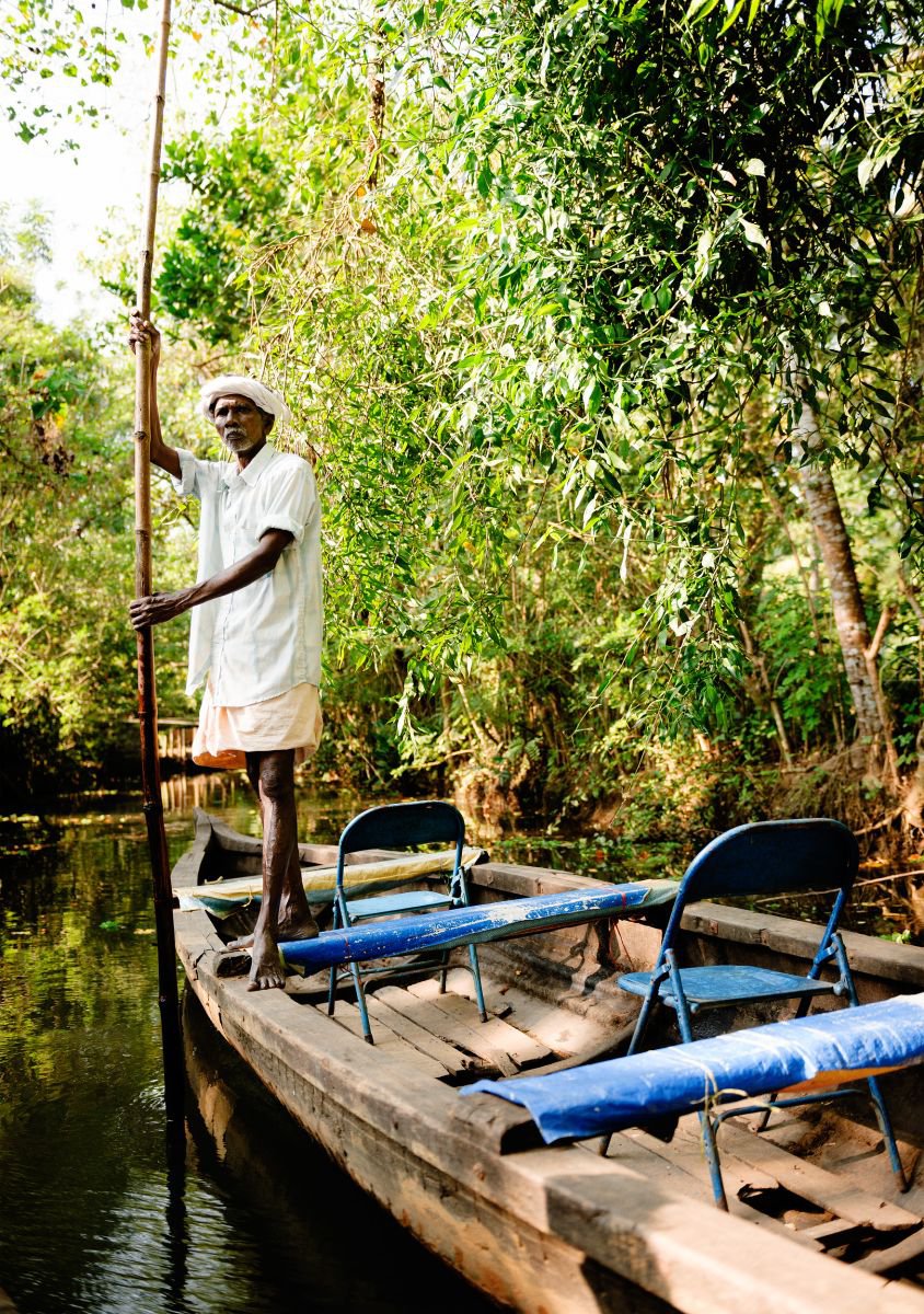 Boatman, Kerala Backwaters. (84x119cm) by Tom Hanslien