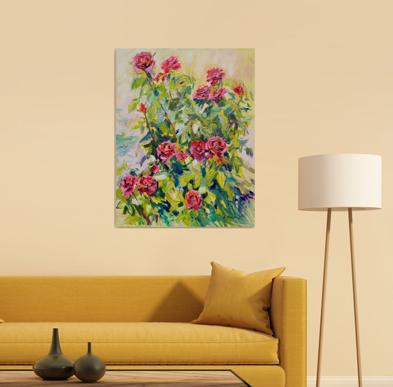A bush of roses in a garden