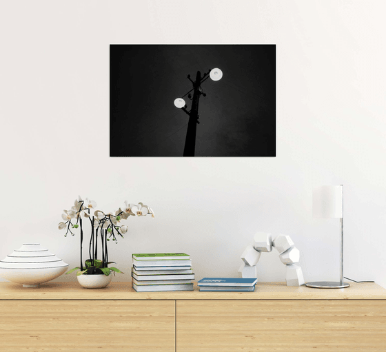 two lightbulbs in the darkness