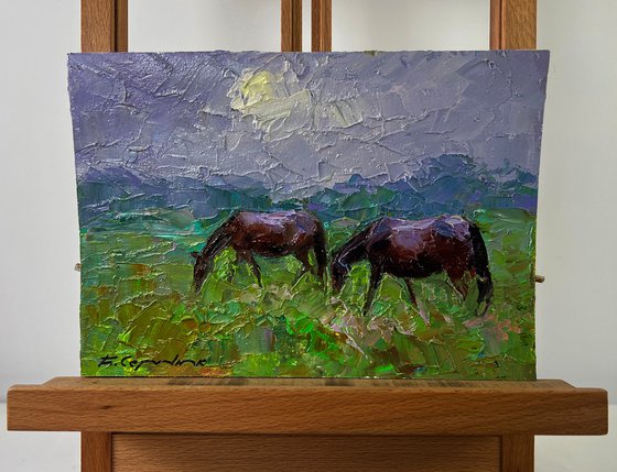 Horses Grazing Peacefully