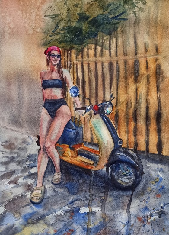 A girl with a scooter