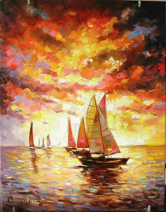 Sailboats on the sea. Flaming evening