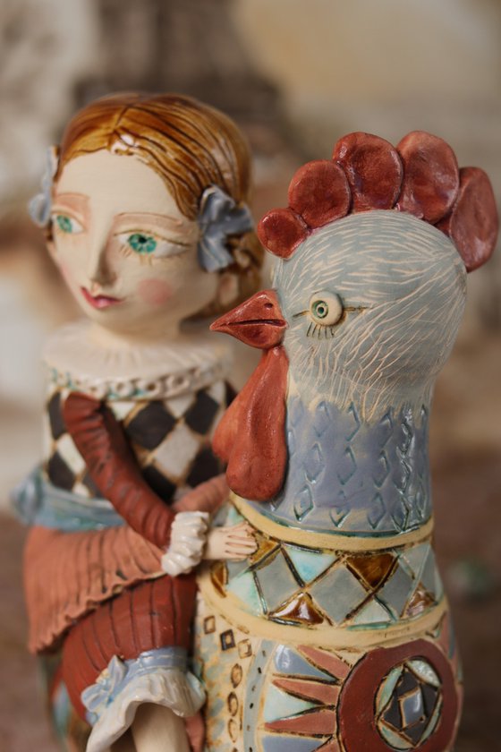 Vintage dressed girl riding the rooster. From "Le Carousel, Hommage à l'Innocence" project by Elya Yalonetski