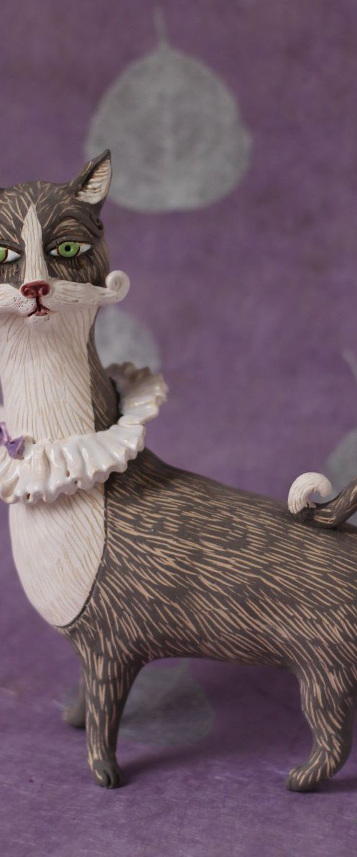 Black cat with a white collar. by Elya Yalonetski by Elya Yalonetski