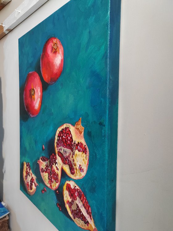 Pomegranate on blue