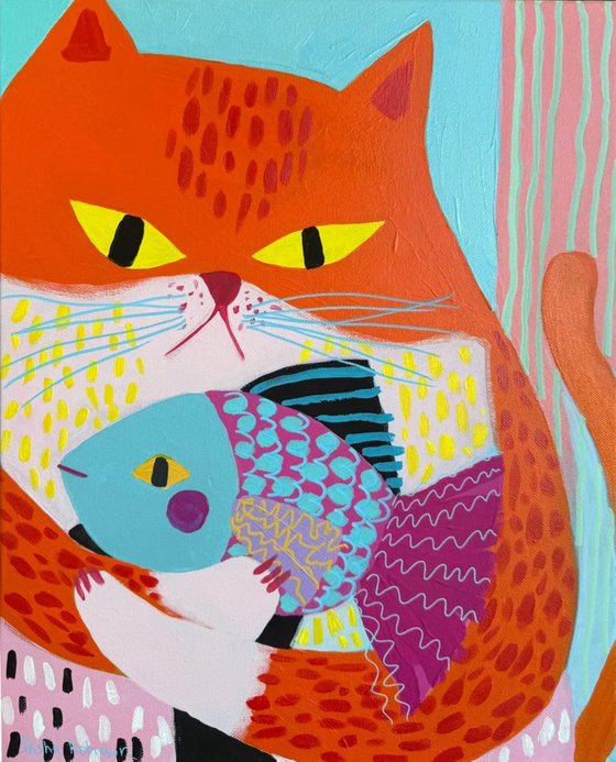 Orange Cat with Colorful Fish
