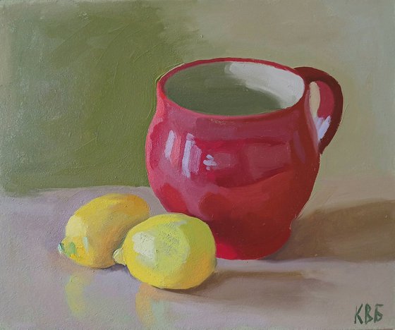Red Cup and Two Lemons