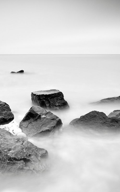 Stony Coast in milky Water by Ben Schreck