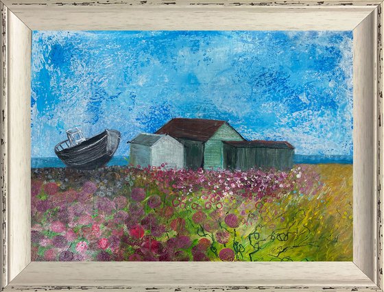 Sea thrift beach huts boat