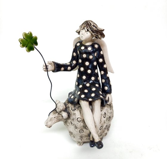 Whimsical Angel on Sheep