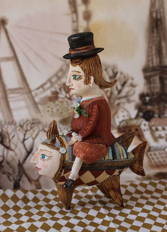 Vintage dressed boy riding the fish. From "Le Carousel, Hommage à l'Innocence" project by Elya Yalonetski