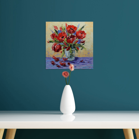 Red flowers in a vase.
