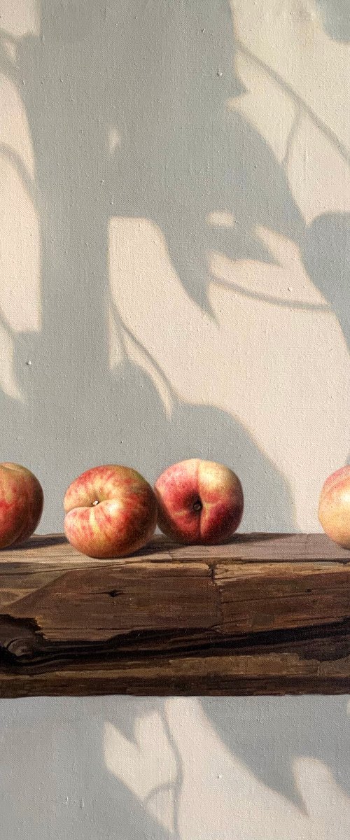 Still life:peaches on the wooden table by Kunlong Wang