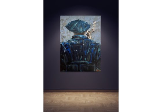 Man in blue smoking a cigar