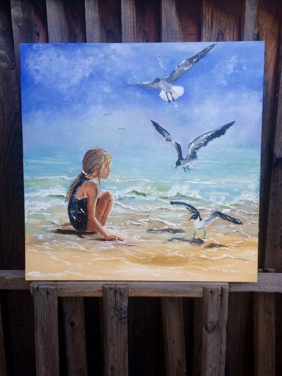 Girl and a seagulls