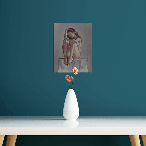 Seated female nude