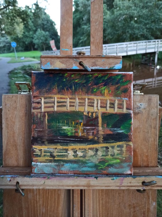 Small wooden bridge. Pleinair