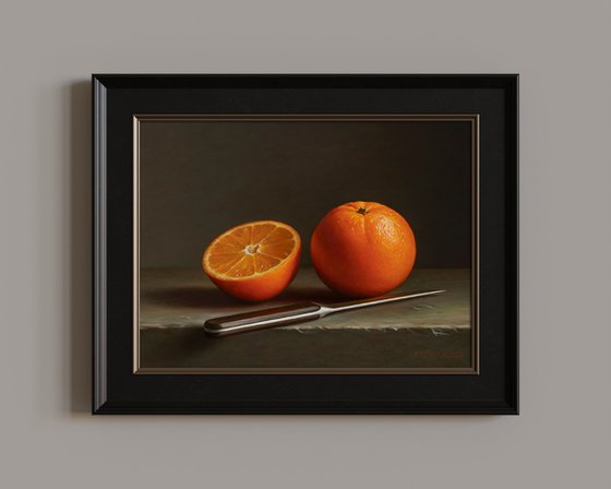 Oranges with a knife