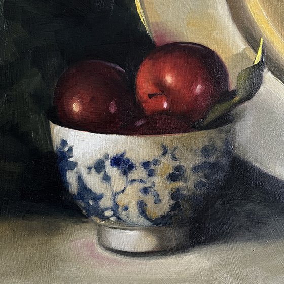 Plums and gold plate.