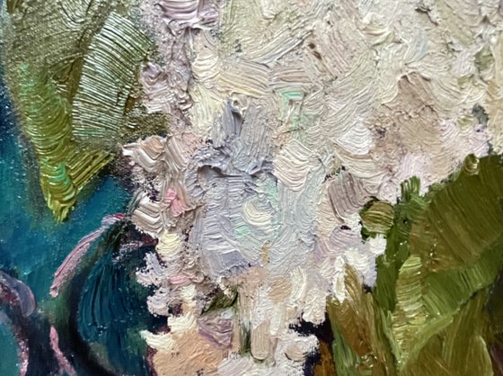 Spring still life with ornamental fabric