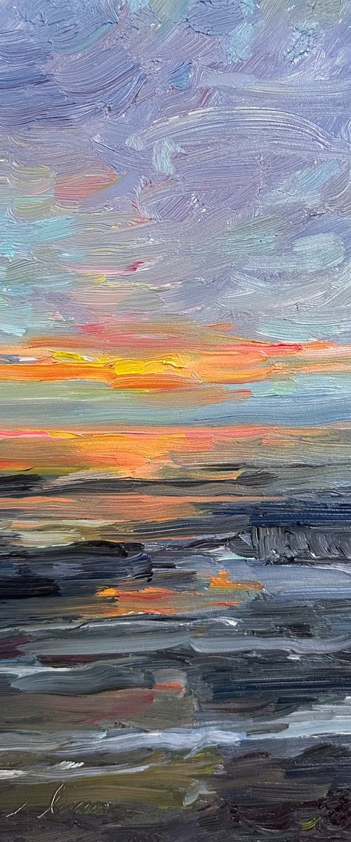 The sunset over the Atlantic Ocean by Irina Sherbiak