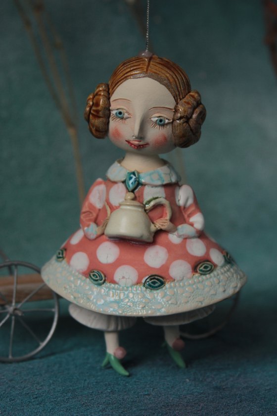 Little Girl with a teapot. Hanging sculpture, bell doll by Elya Yalonetski