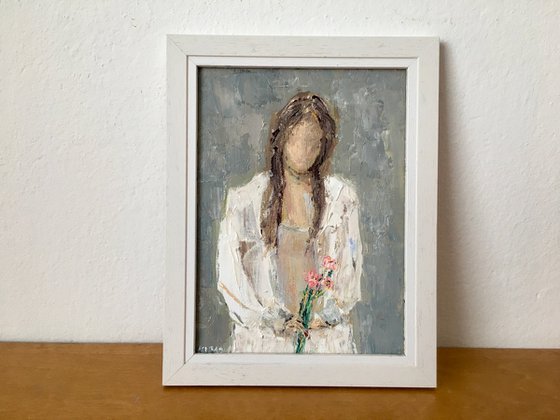 Girl with bouquet of flowers