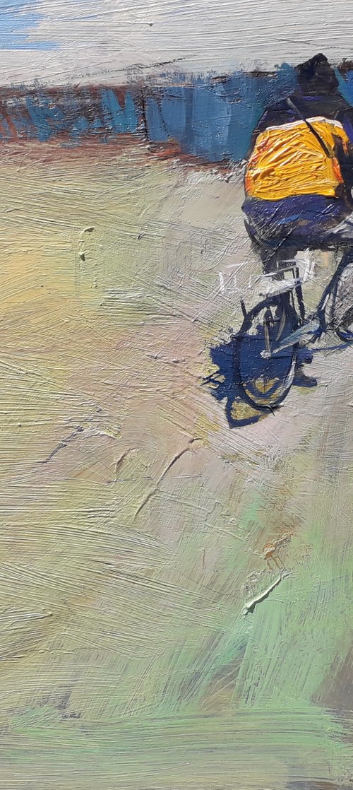 Yellow cyclist man by Róbert Kormos