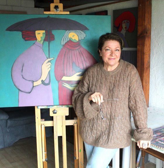 Two under an umbrella.