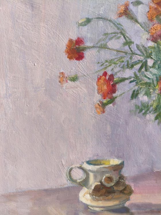 Marigolds in a clay pot