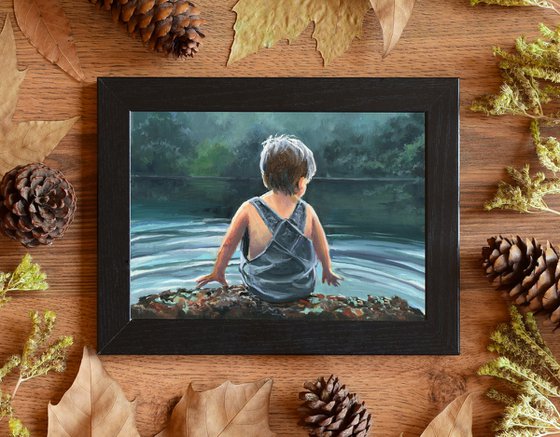 Child in twilight lake scene