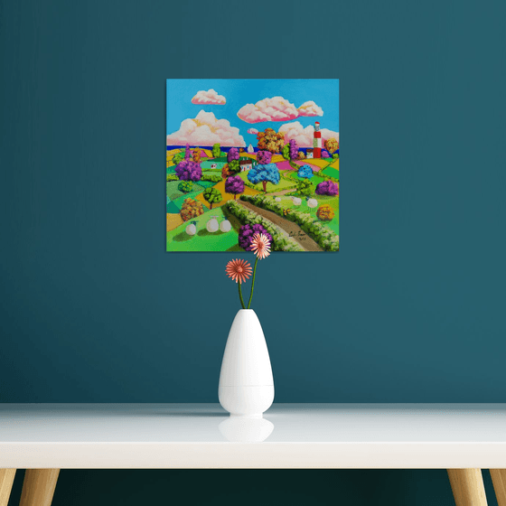 Folk art sheep and a Lighthouse painting