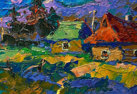 Village and blue mountains
