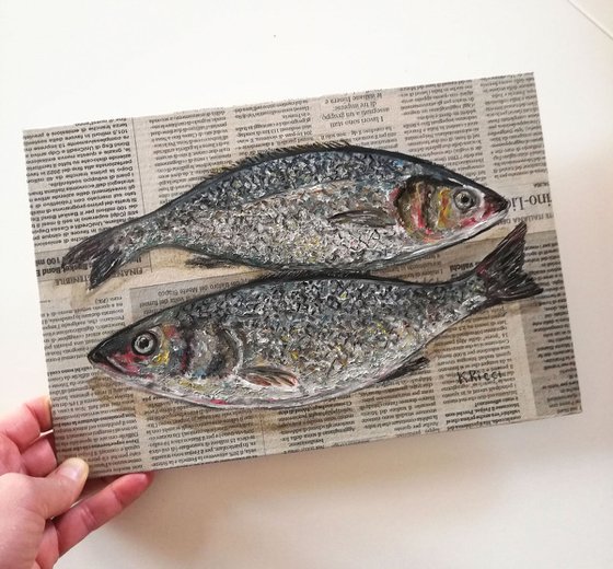 Scaled Fishes on Newspaper