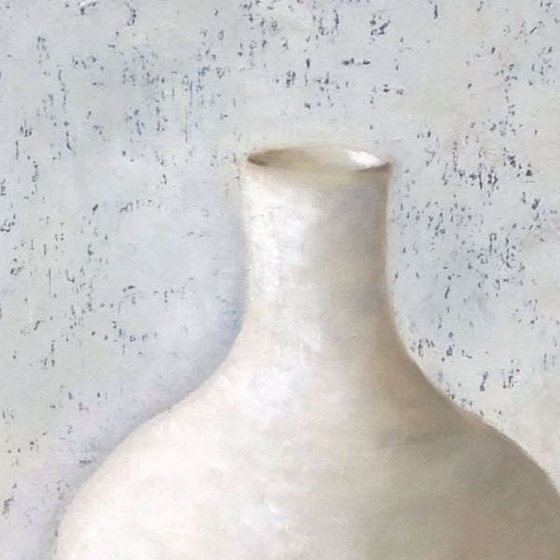 White vase on white table