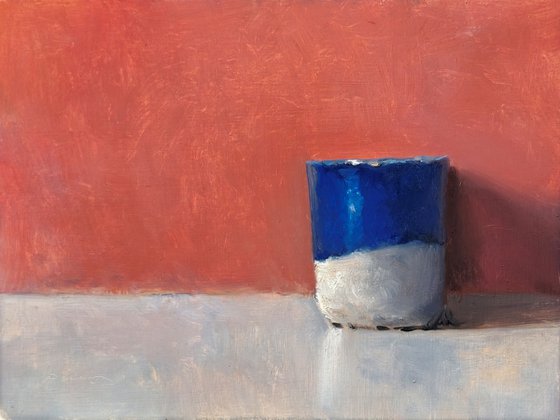 A Blue Cup by a Rainy Day