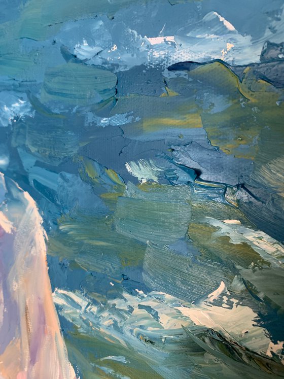 Woman by the ocean.